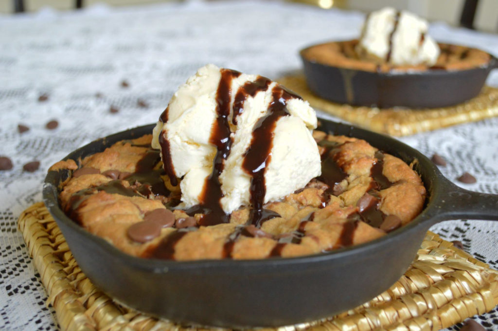 The best cast iron chocolate chip recipe is right here! Top this iron skillet cookie off with some ice cream and you'll have the perfect dessert! - The Kreative Life